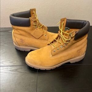 Timberland Tan and Black Ankle-High Boots with Rugged Sole